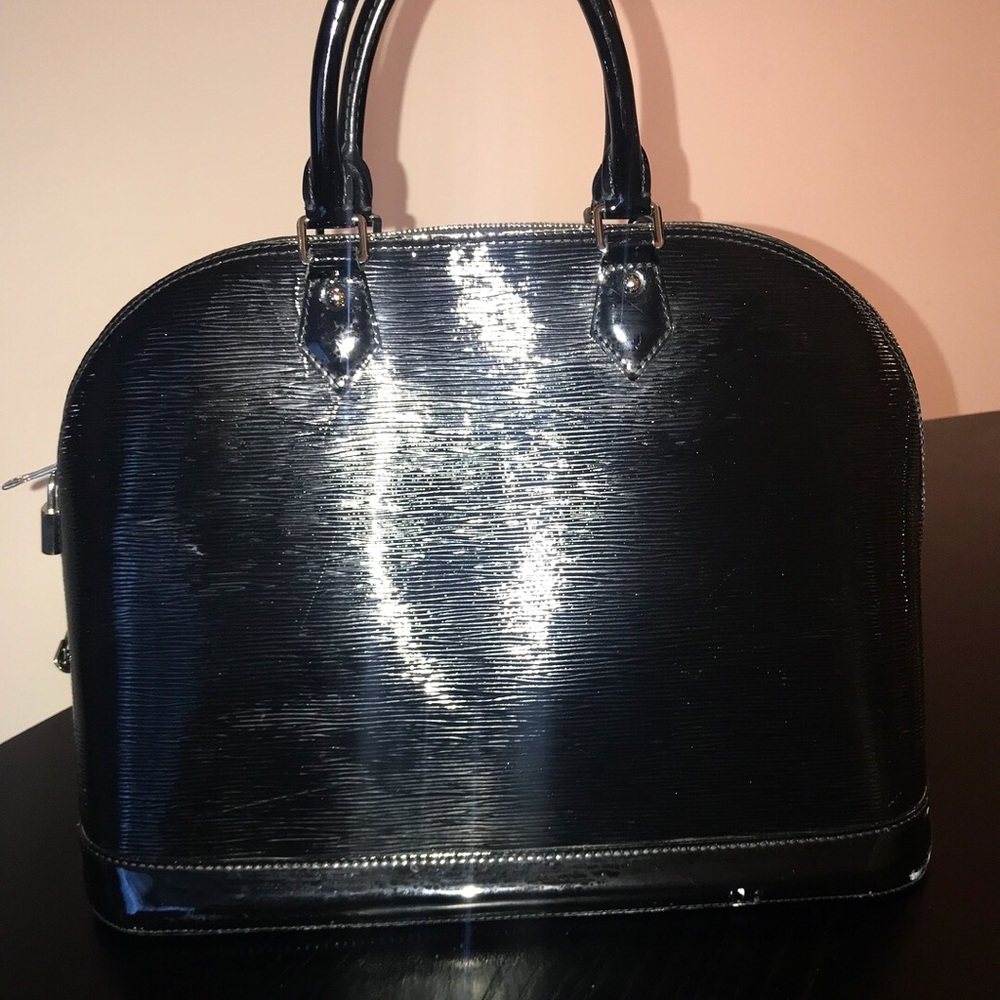 Authentic Louis Vuitton Alma GM - Picture 4 of 5